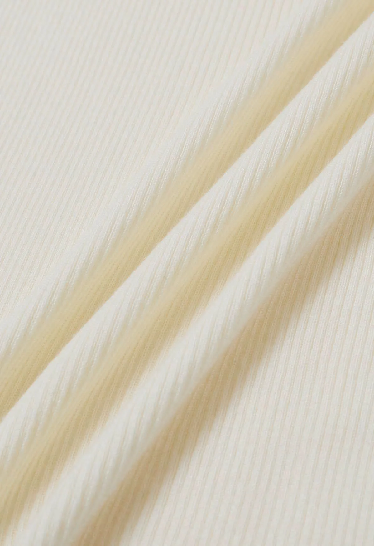 Faux haut en tricot deux pièces à col montant en crème