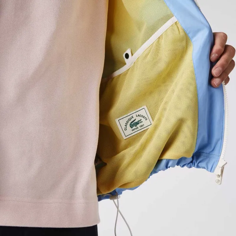 Veste Lacoste color-block légère et déperlante avec capuche dissimulée